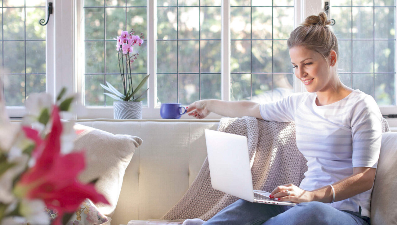 woman using macbook