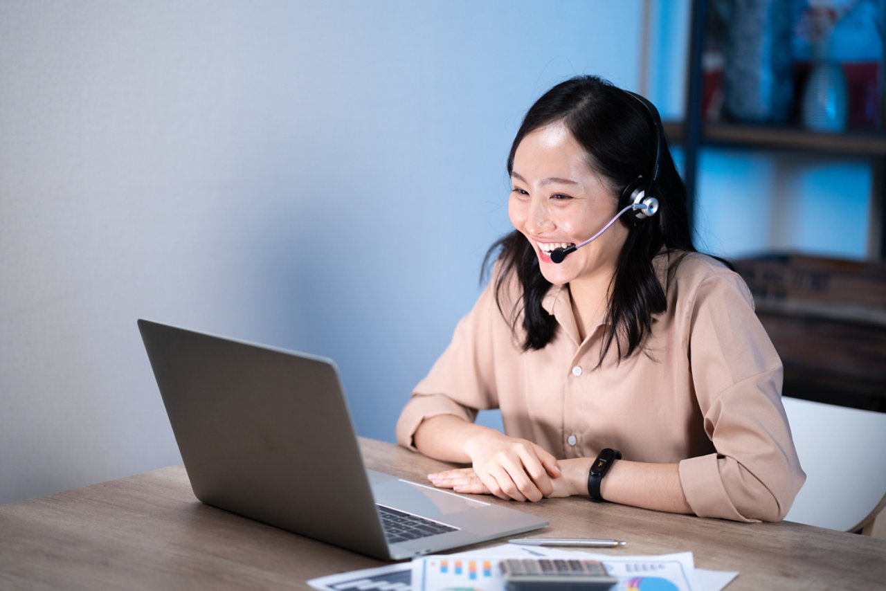 Asian female customer care service smiling