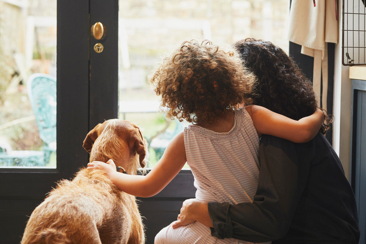 Young family waiting by the door