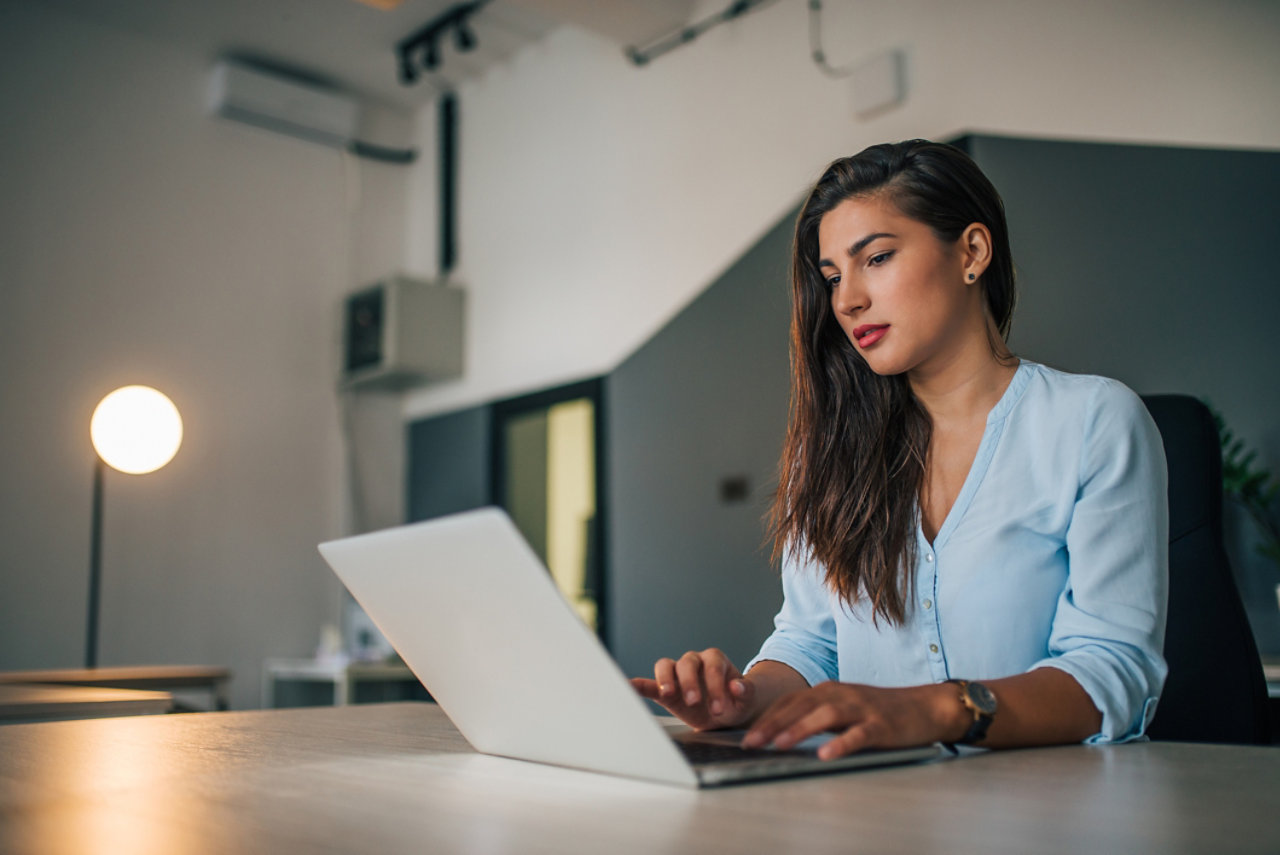 beautiful businesswoman using laptop in the office