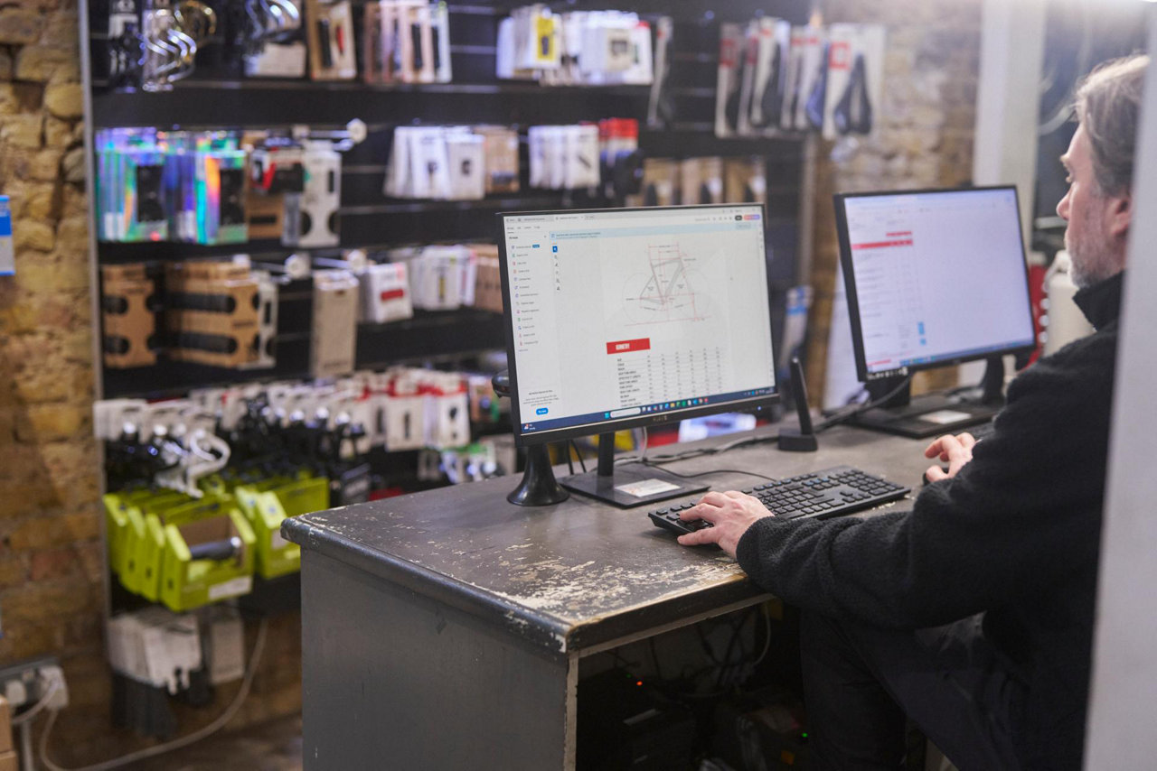 bikeshop owner using computer