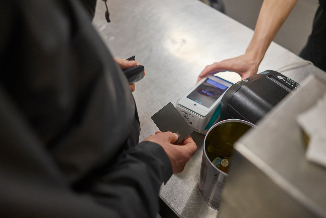 customer tapping card for a transaction