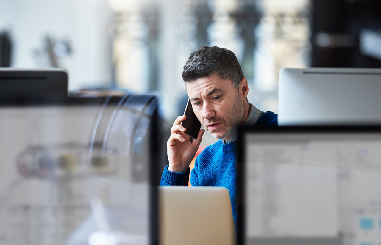 businessman on the phone in a modern office