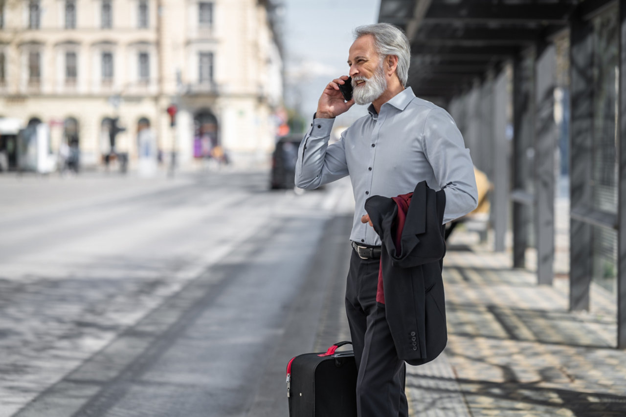 Businessman outside on phone