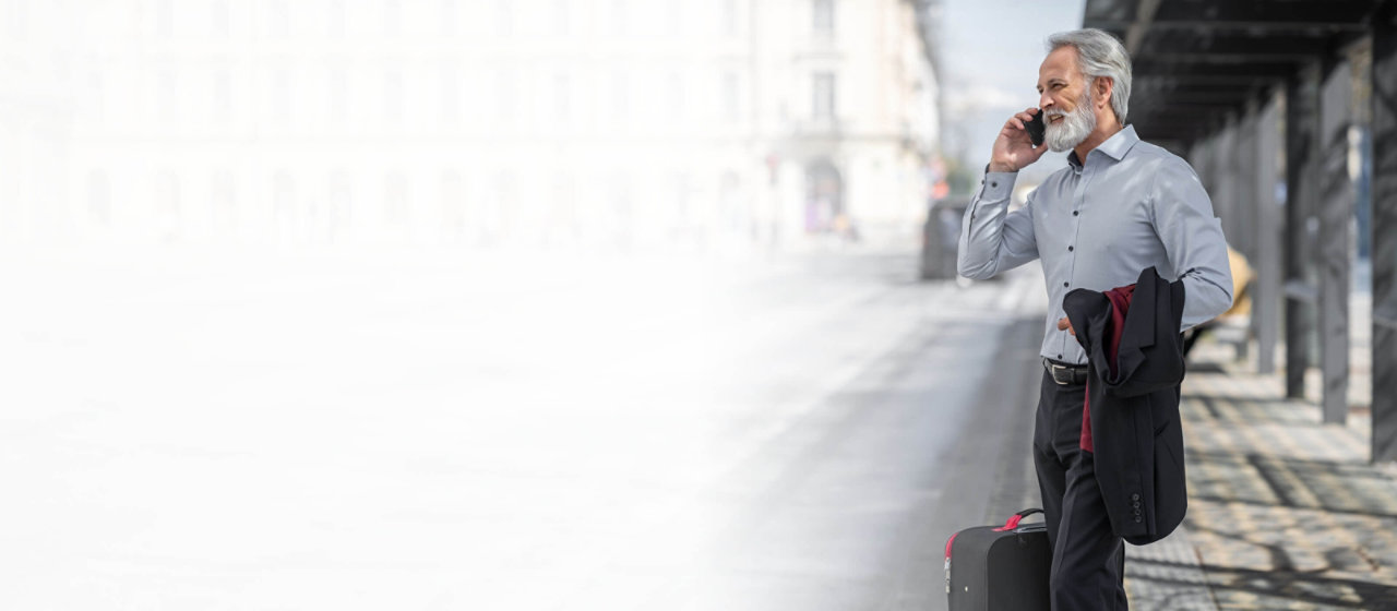 Businessman outside on phone