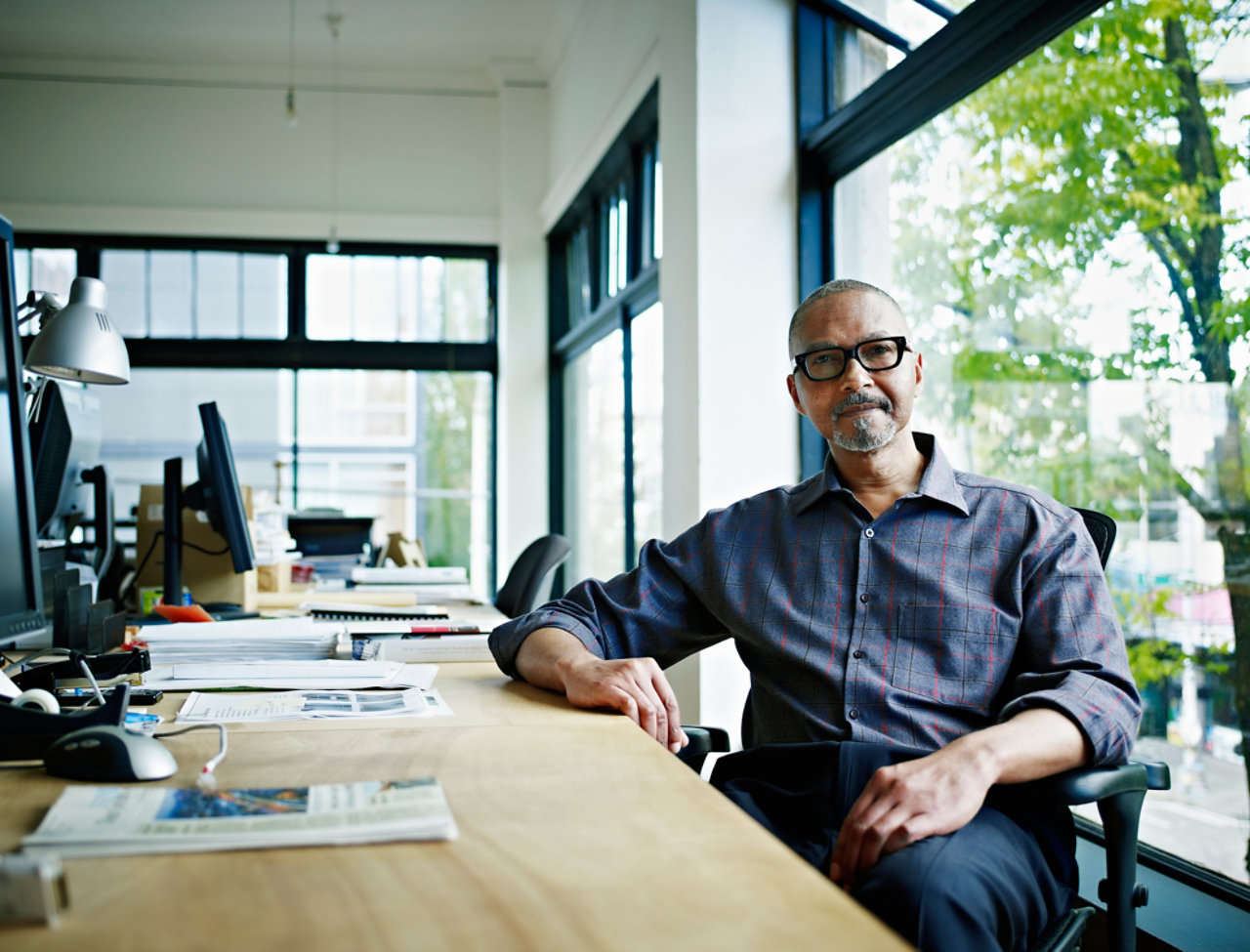 Businessman sitting at desk in office