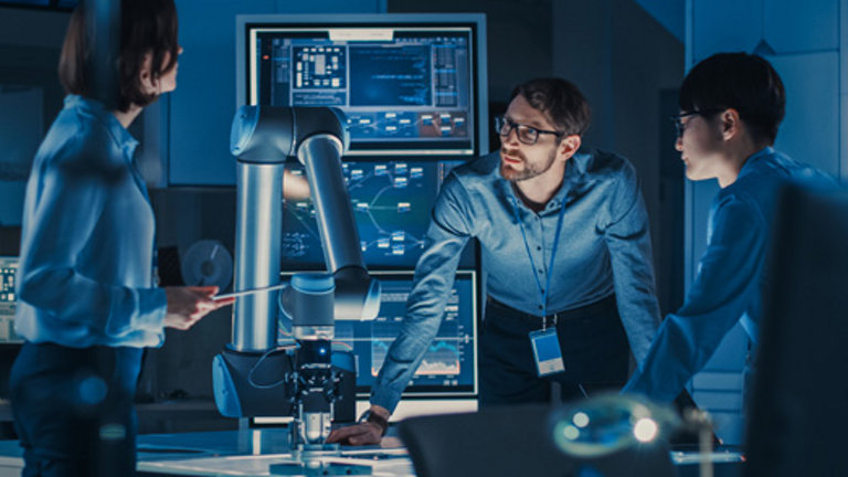 Businessmen in meeting with digital screen