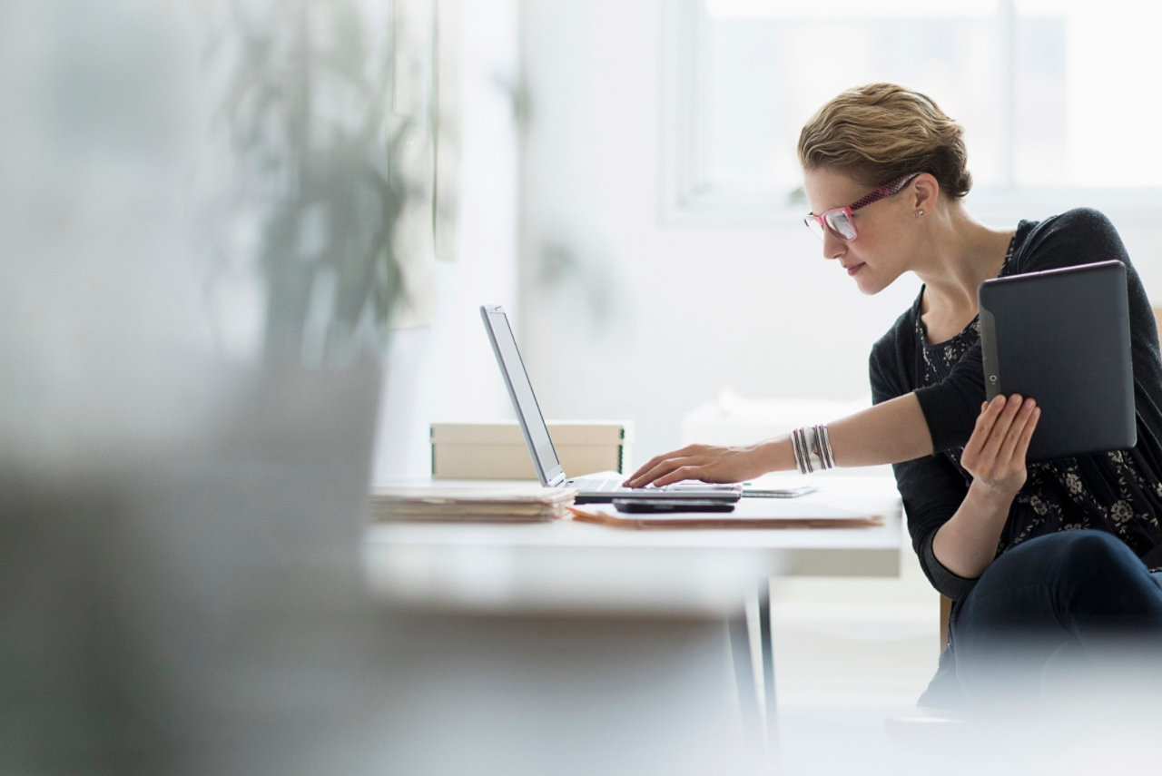 Business woman using laptop