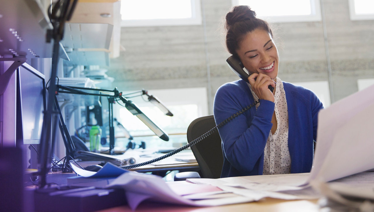 woman on phone in office