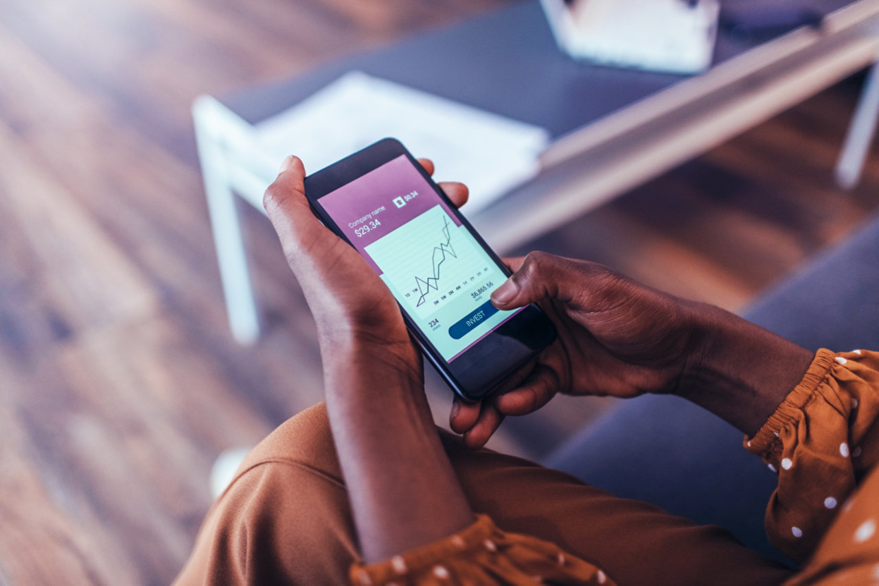 person using smartphone for viewing data