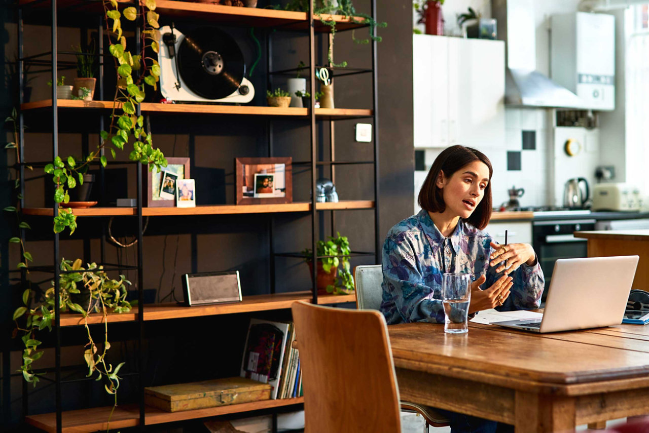 Woman having a call on her laptop