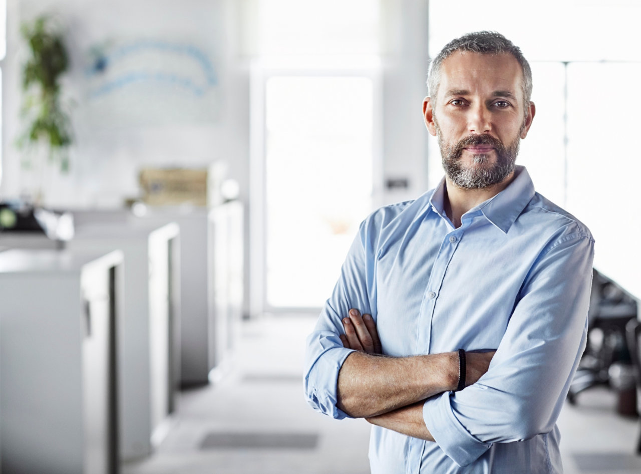 male businessman with crossed arms