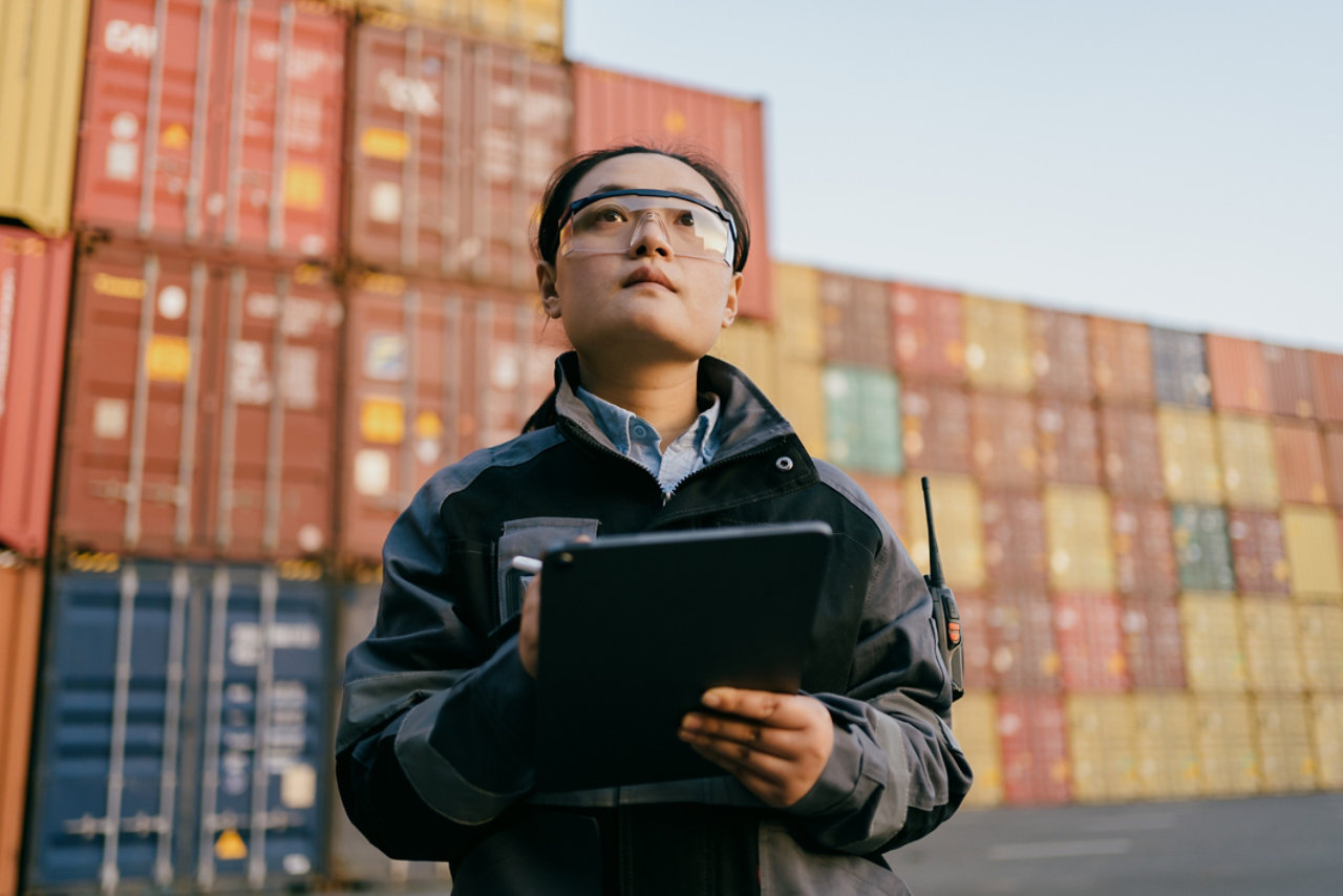 Person inspecting containers