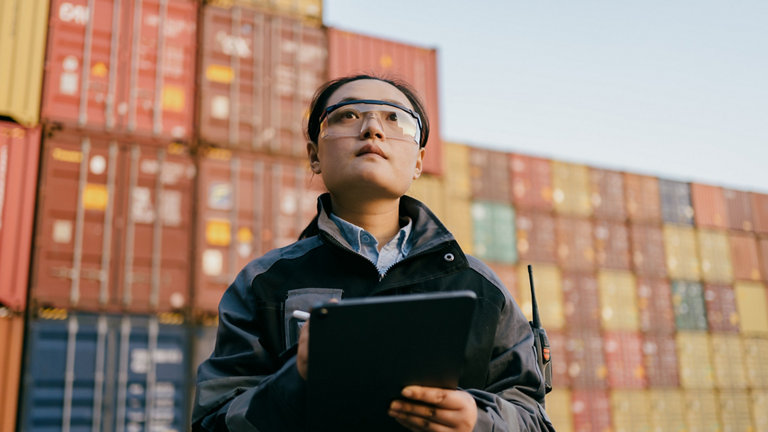 Person inspecting containers