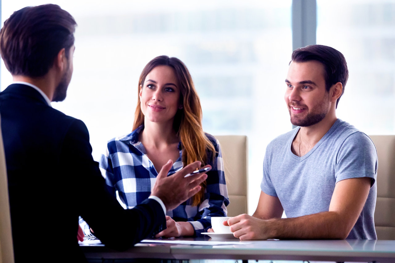 couple talking to advisor