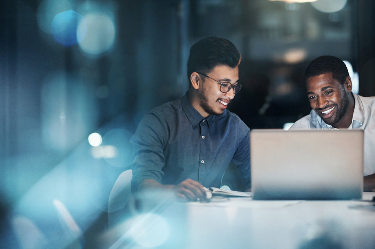 Two young businessmen working