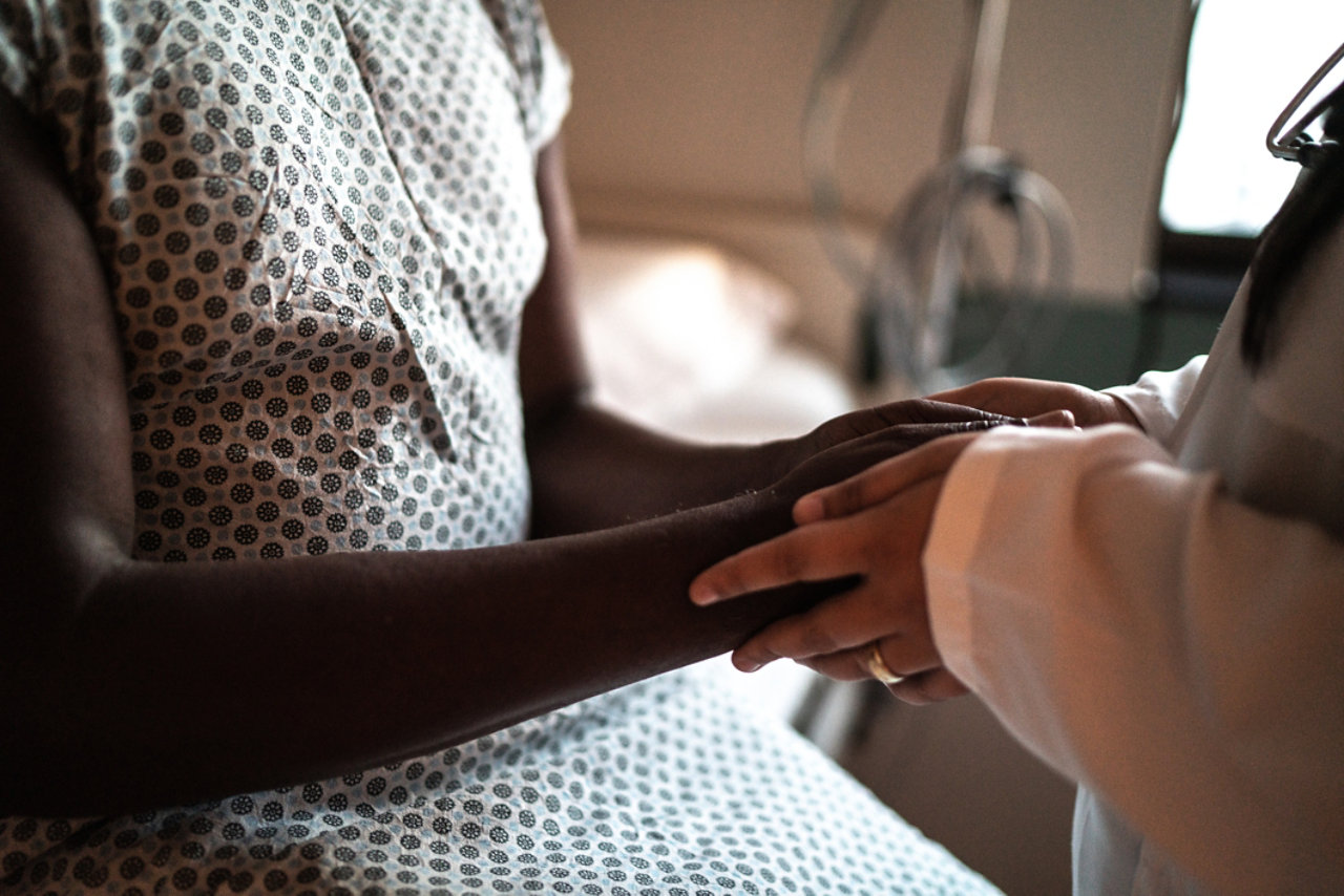 dr holding patient's hands