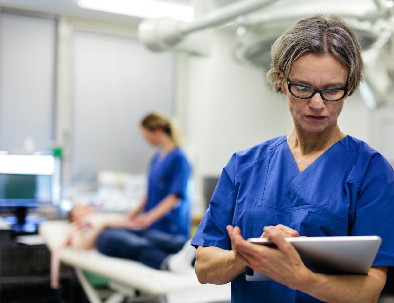 Female nurse using a tablet