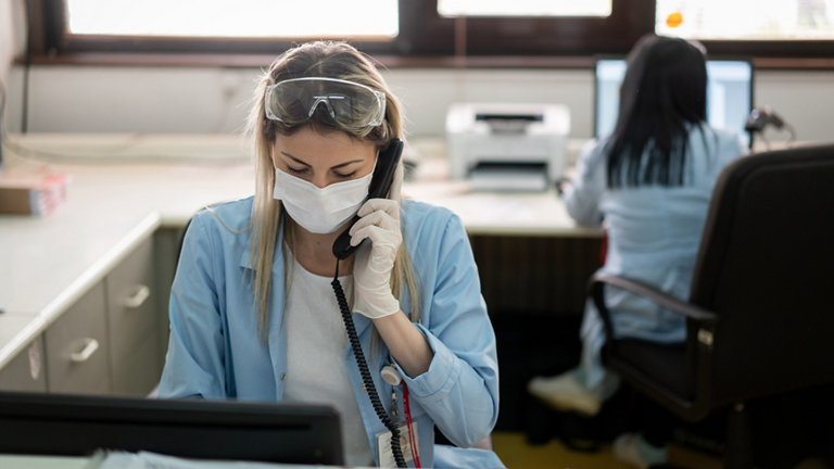 Female doctor talking on the phone