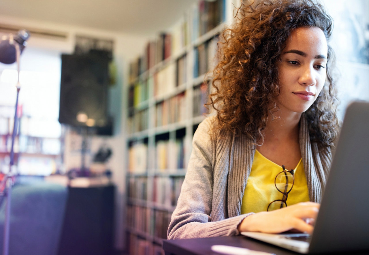 girl working in the library