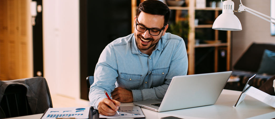 Man working at desk from home