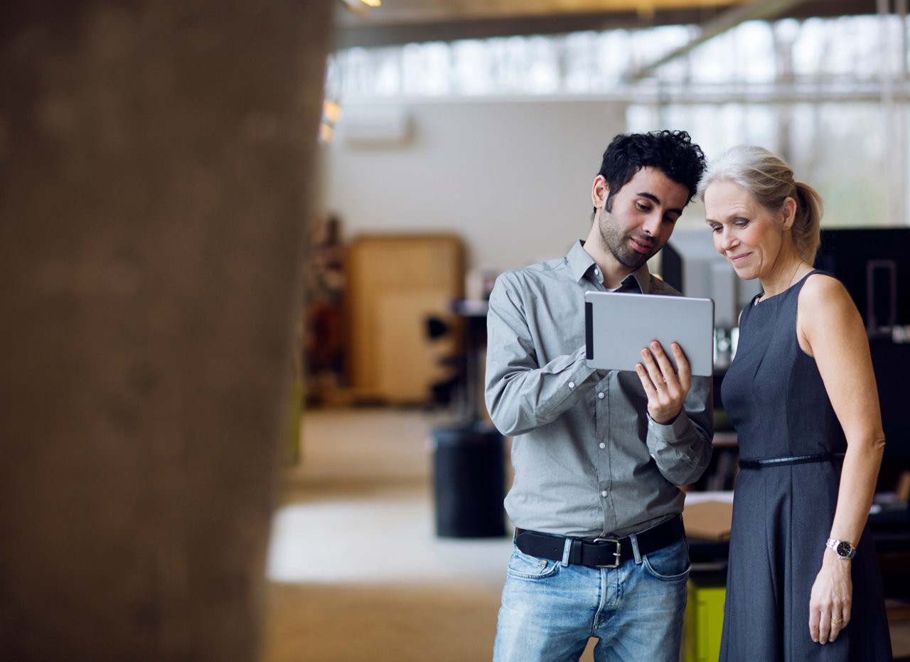 man and woman in a meeting