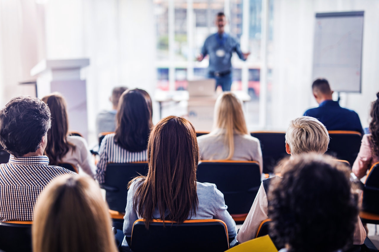 man talking at event seminar