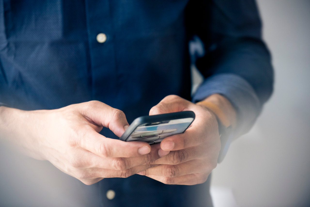 Man using smartphone