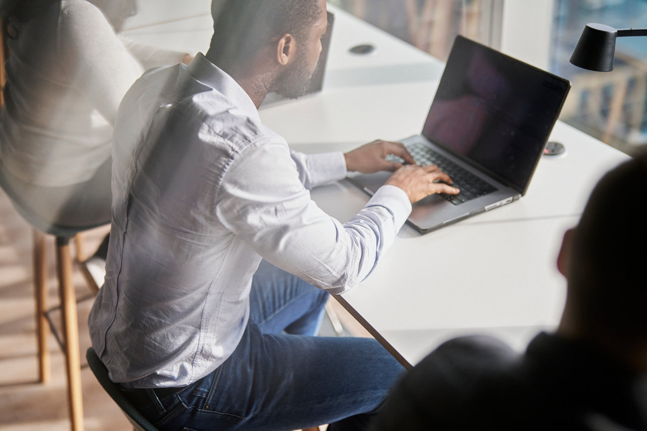 person working at laptop