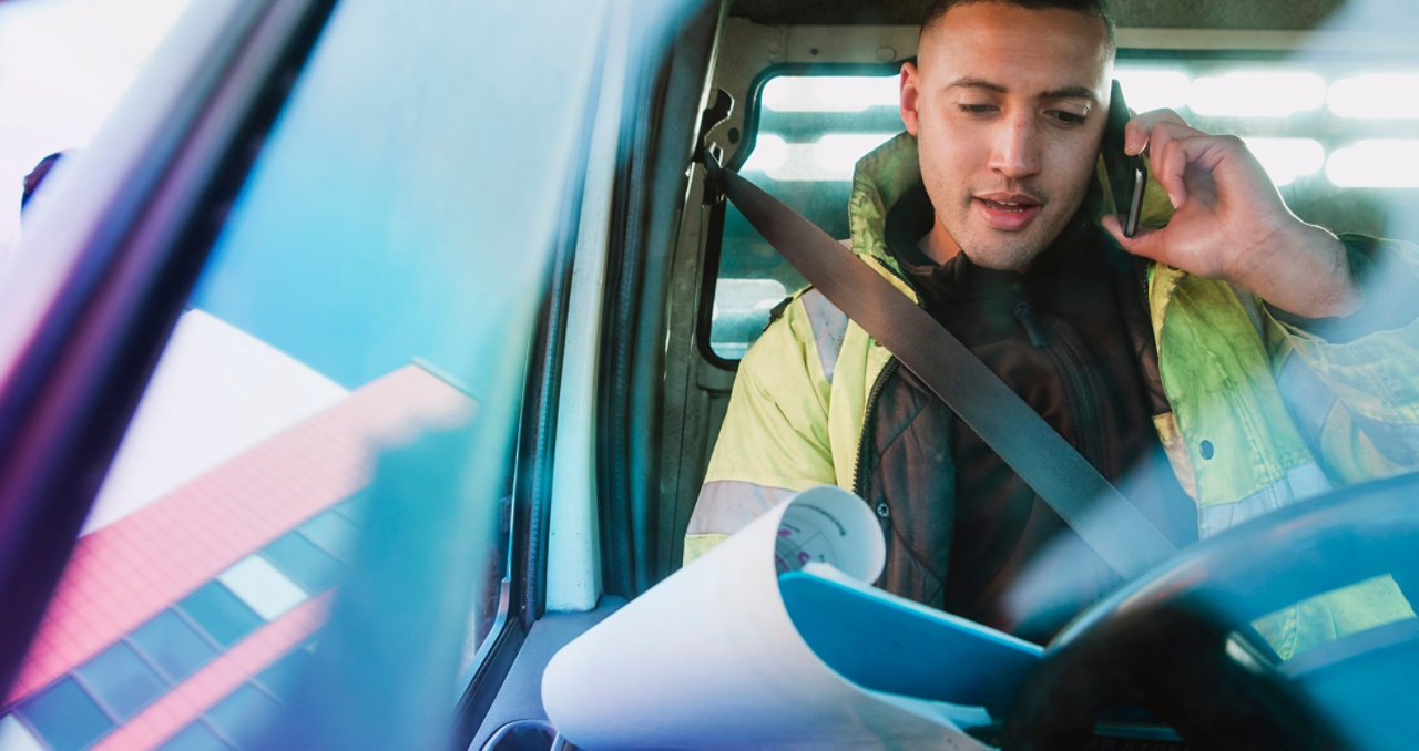 Manual worker in his van