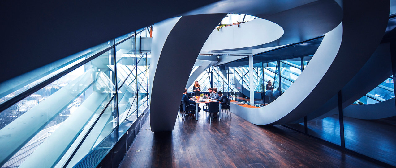 woman holding tablet device