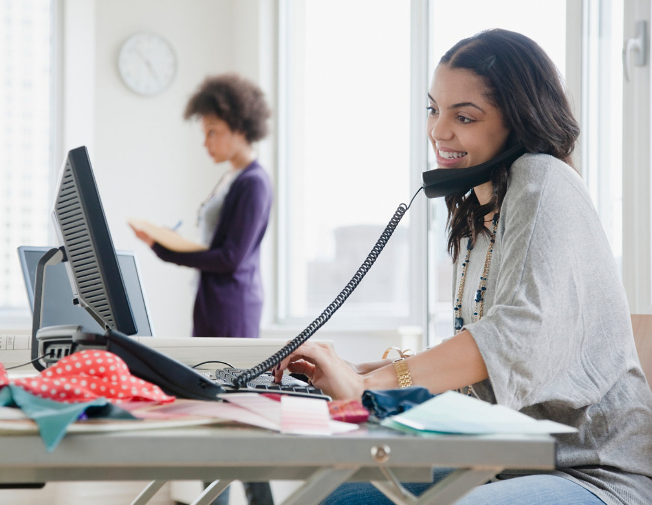 woman smiling in office environment