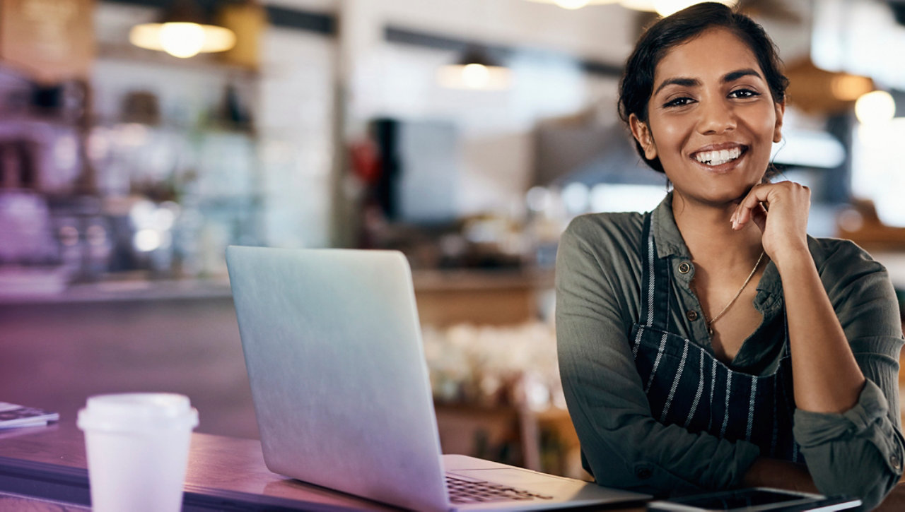 woman sitting at her desk