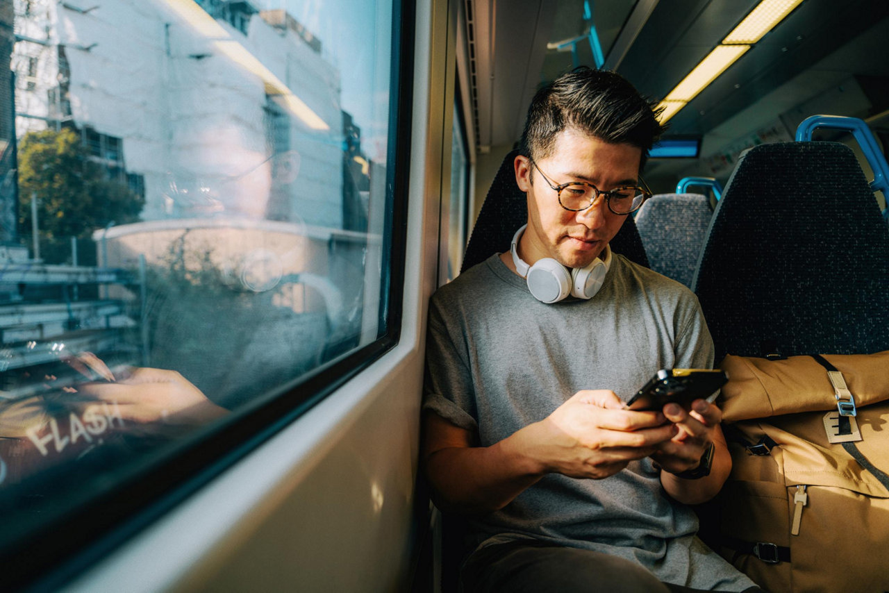 man holding phone on farm