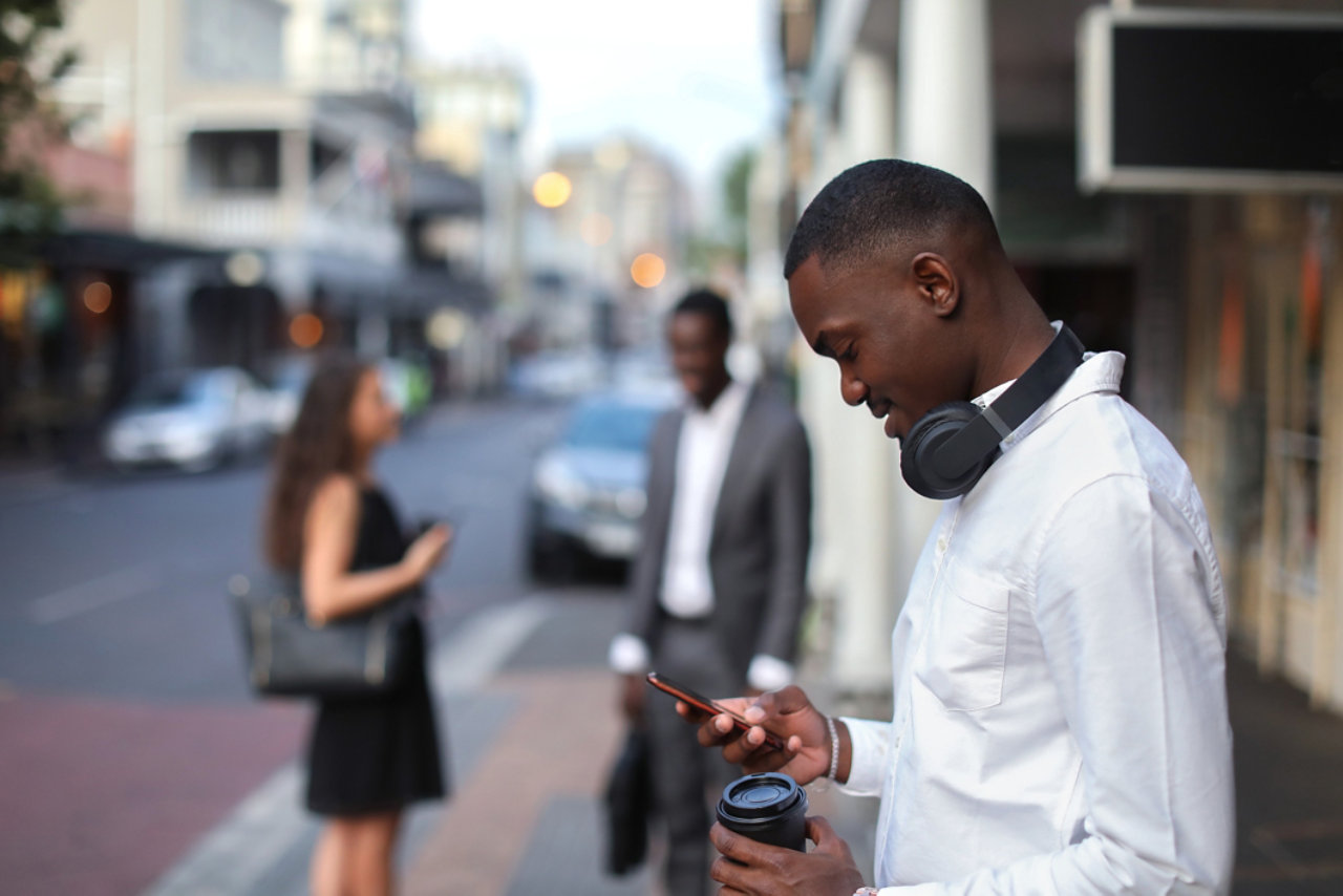 Young man at the bus stop