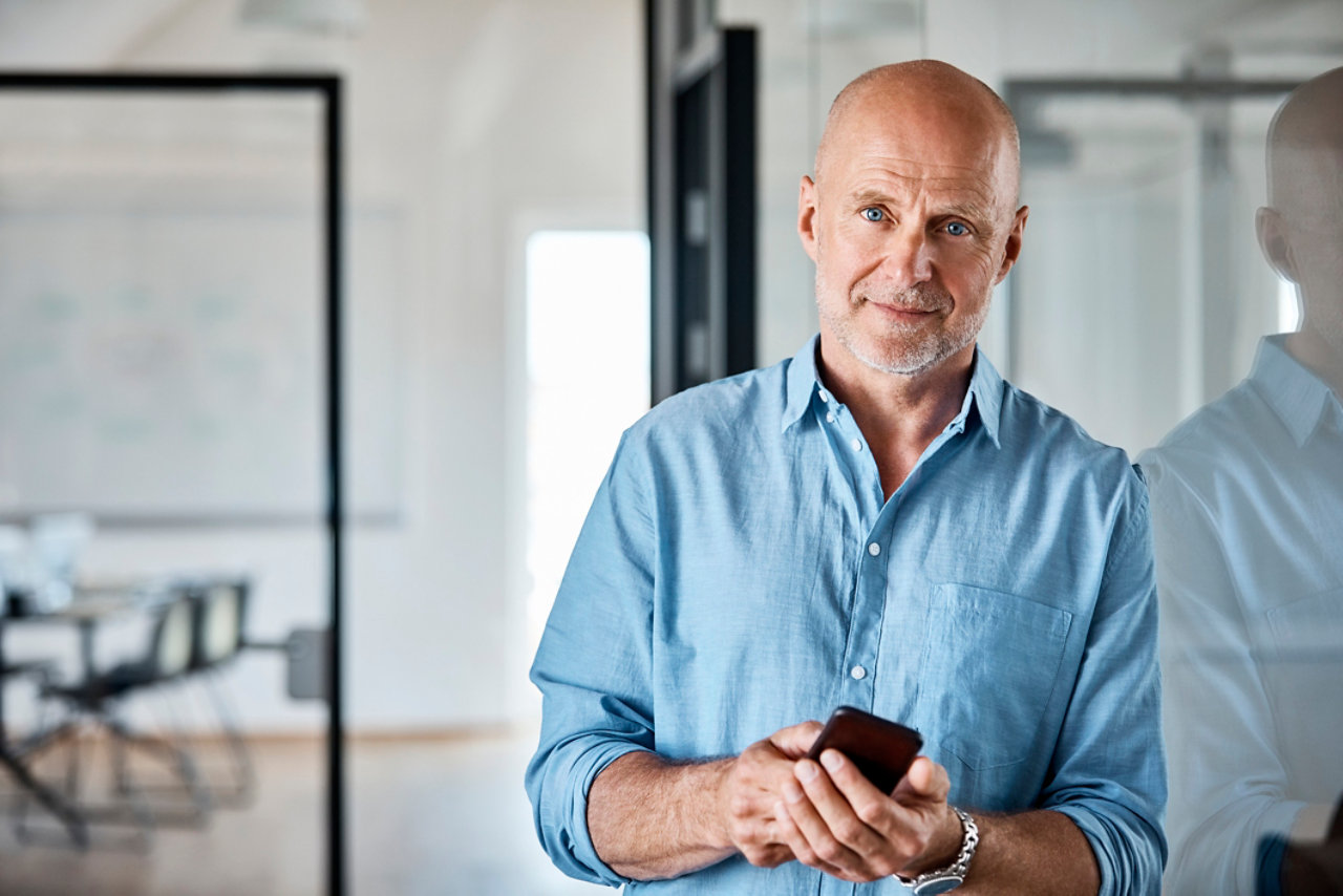 portrait of businessman with a smartphone