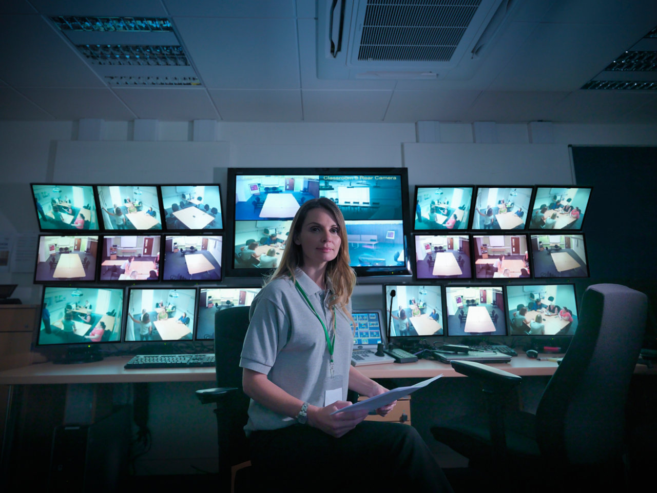 Woman in a security control room
