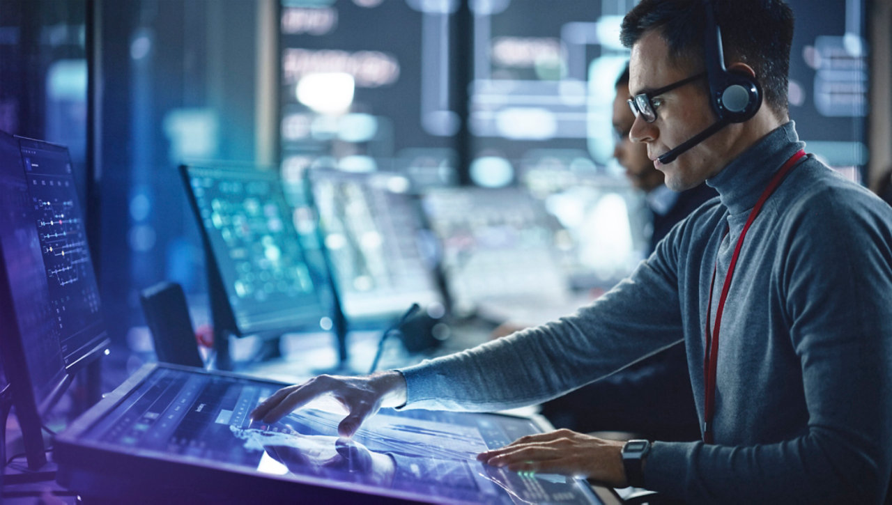 man working in control room