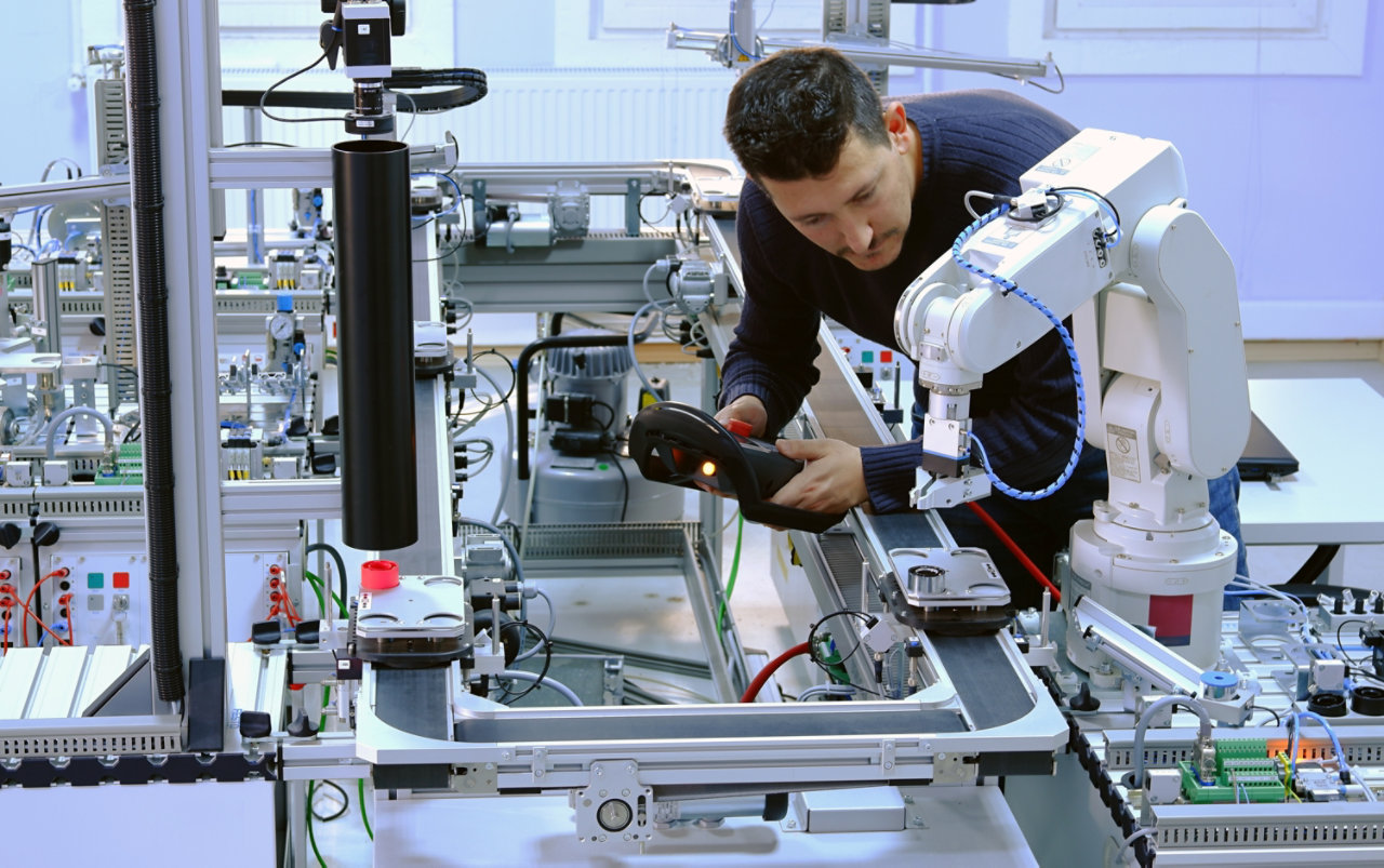 technician using a robotic arm