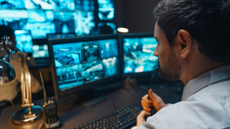 security controller with headset talk on a call