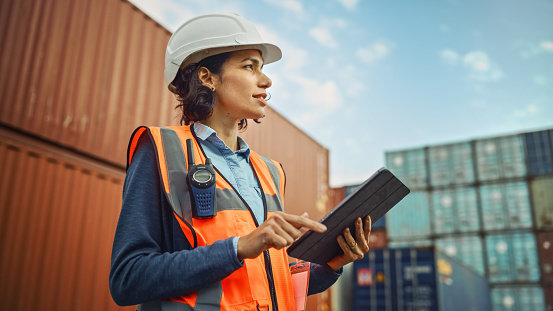 Woman working in shipping port