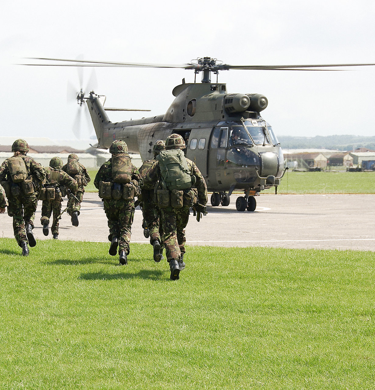 Army helicopters with army personnel