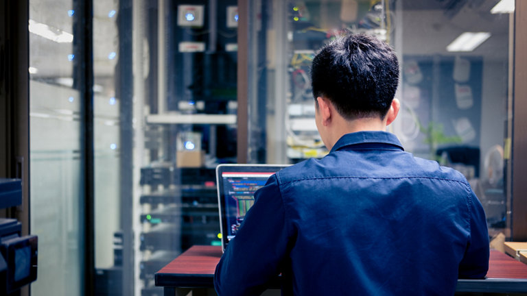 technicians using laptop