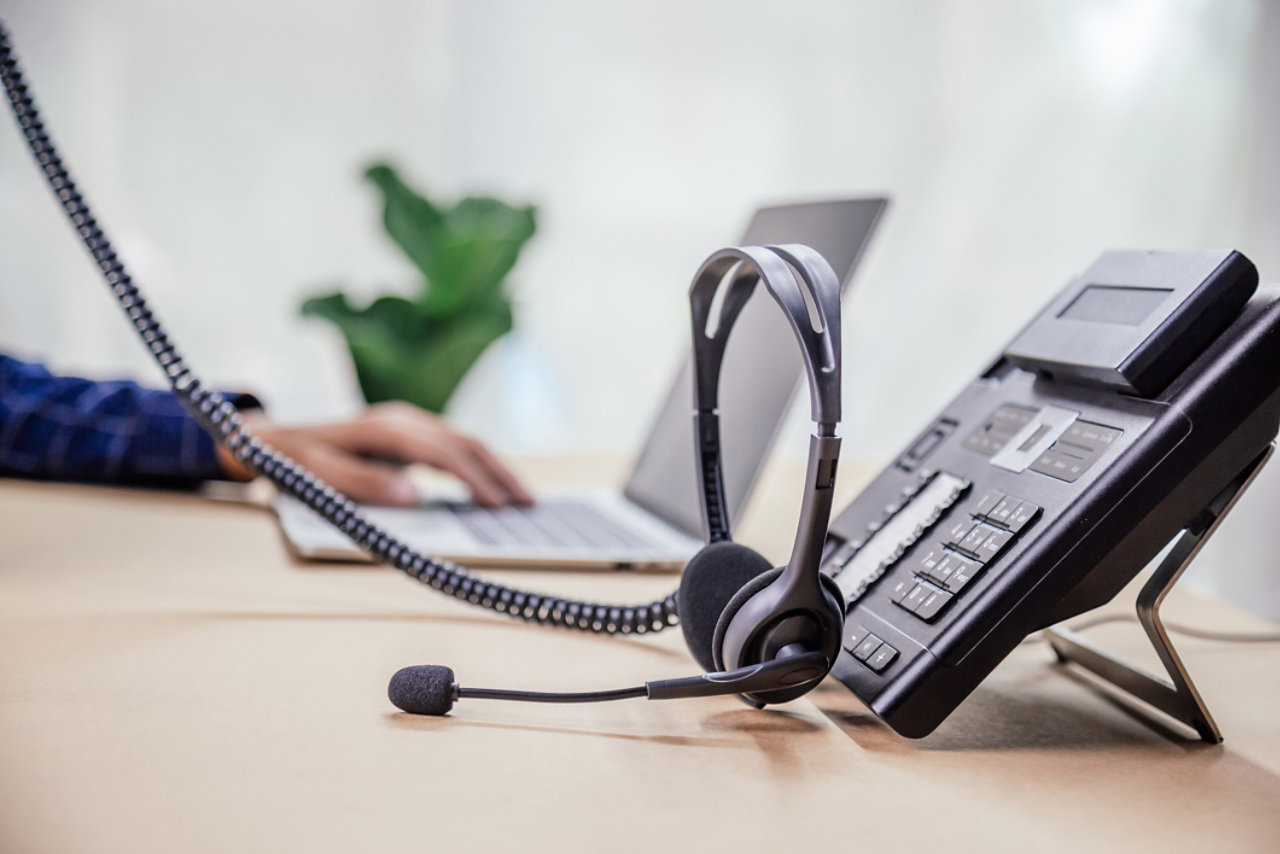 Telephone with headset in office