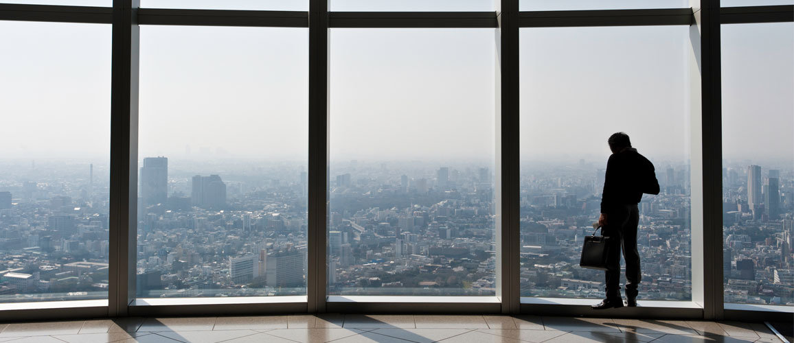 man near window