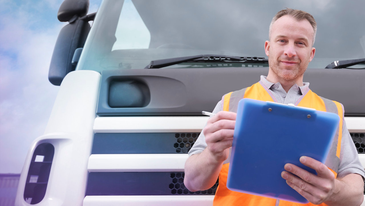 man stood in front of a truck