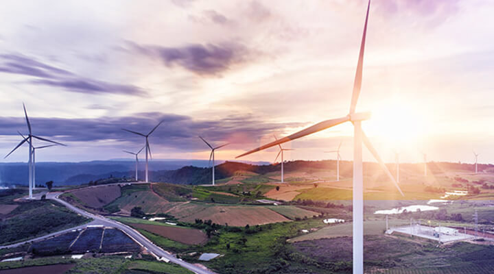 Wind turbines with sunset