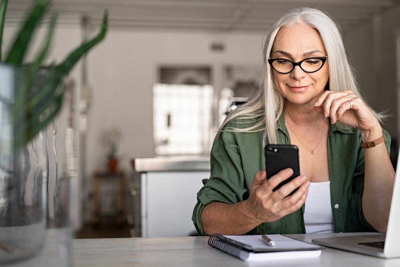 woman messaging with phone