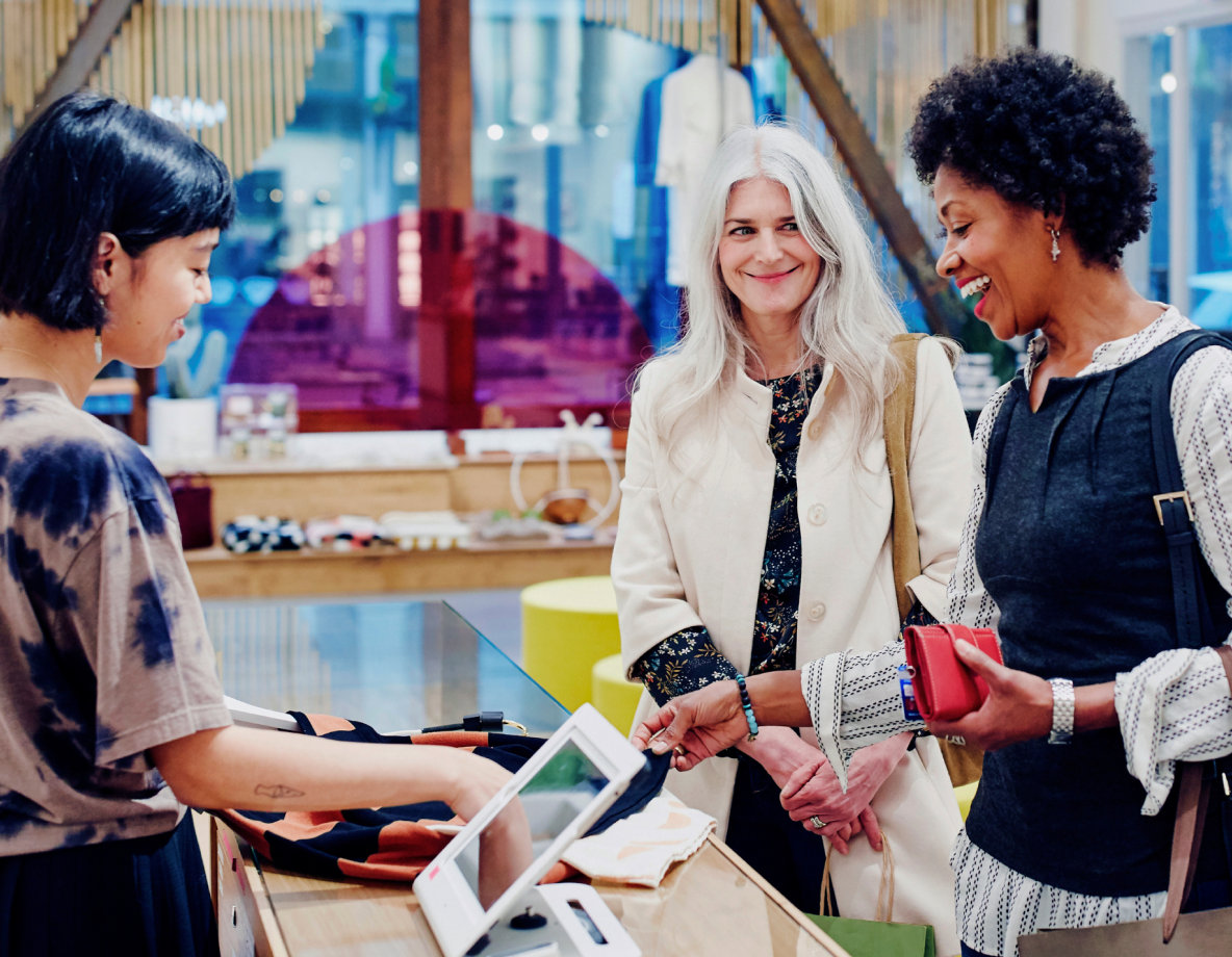Woman at the til shopping