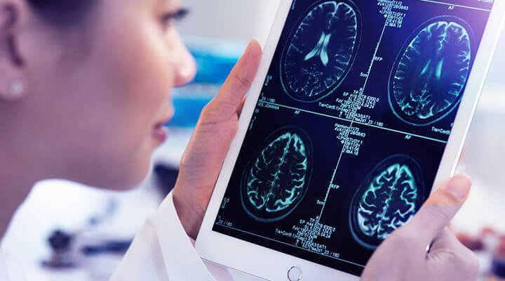 woman using device to check health